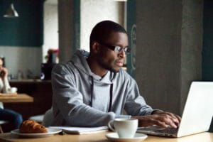 Seriousman using laptop